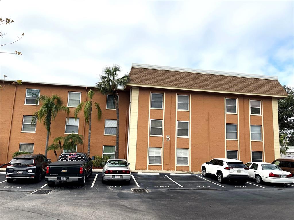 12760 Indian Rocks Road, Unit 562 Largo, FL 33774 - Photo 2 of 22 a car parked in front of a building