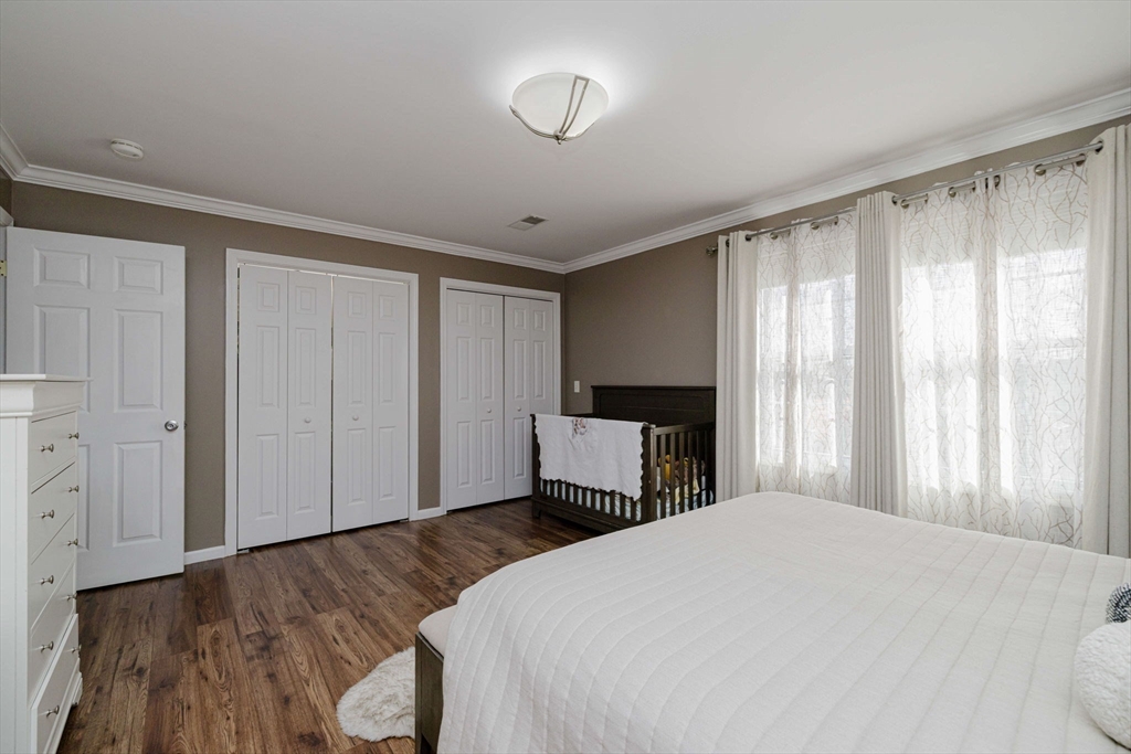 20 Reeves Street Fall River, MA 02721 - Photo 21 of 42 a bedroom with a bed and a window