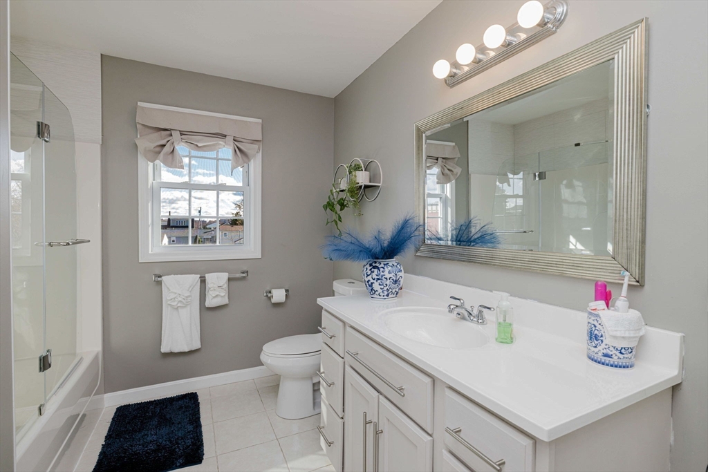 20 Reeves Street Fall River, MA 02721 - Photo 29 of 42 a bathroom with a sink a toilet and a mirror