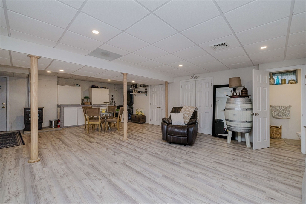 20 Reeves Street Fall River, MA 02721 - Photo 30 of 42 a living room with furniture and a wooden floor