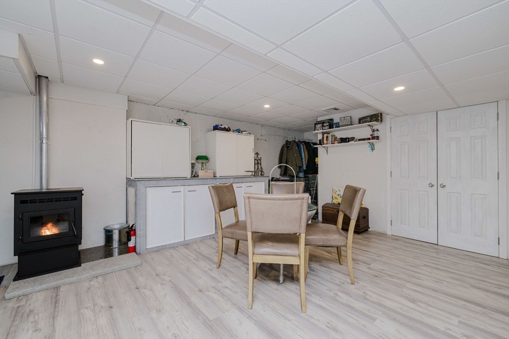 20 Reeves Street Fall River, MA 02721 - Photo 32 of 42 a view of a dining room with furniture and wooden floor
