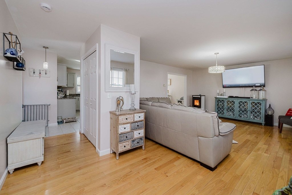 20 Reeves Street Fall River, MA 02721 - Photo 7 of 42 a living room with furniture and a wooden floor