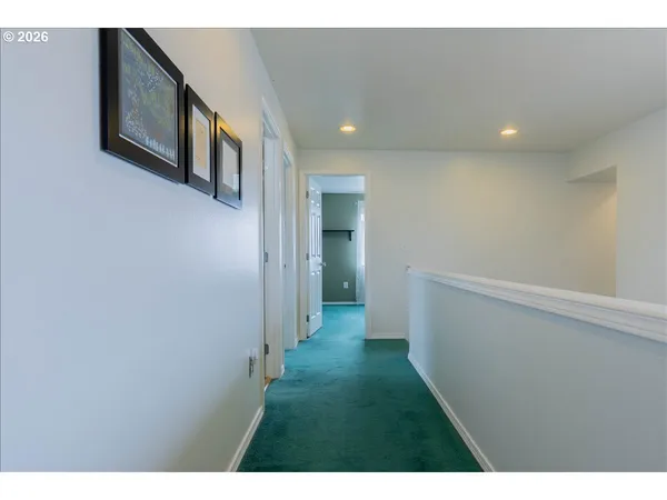 a view of hallway with stairs