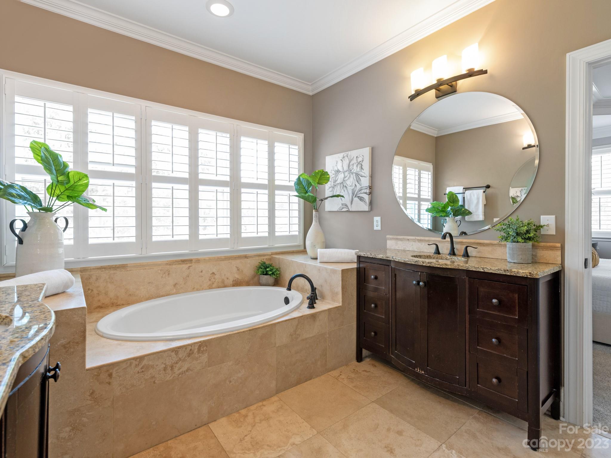 11510 Wheat Ridge Road Charlotte, NC 28277 - Photo 22 of 48 a spacious bathroom with a tub sink and mirror