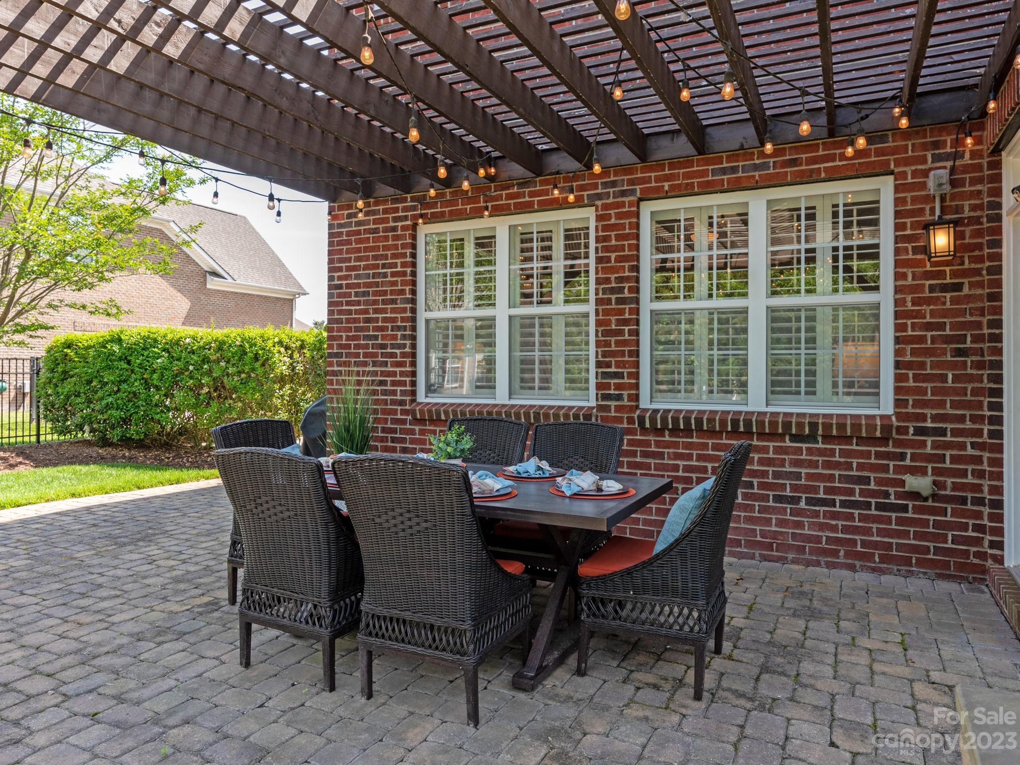 11510 Wheat Ridge Road Charlotte, NC 28277 - Photo 36 of 48 a dining room with furniture and a yard
