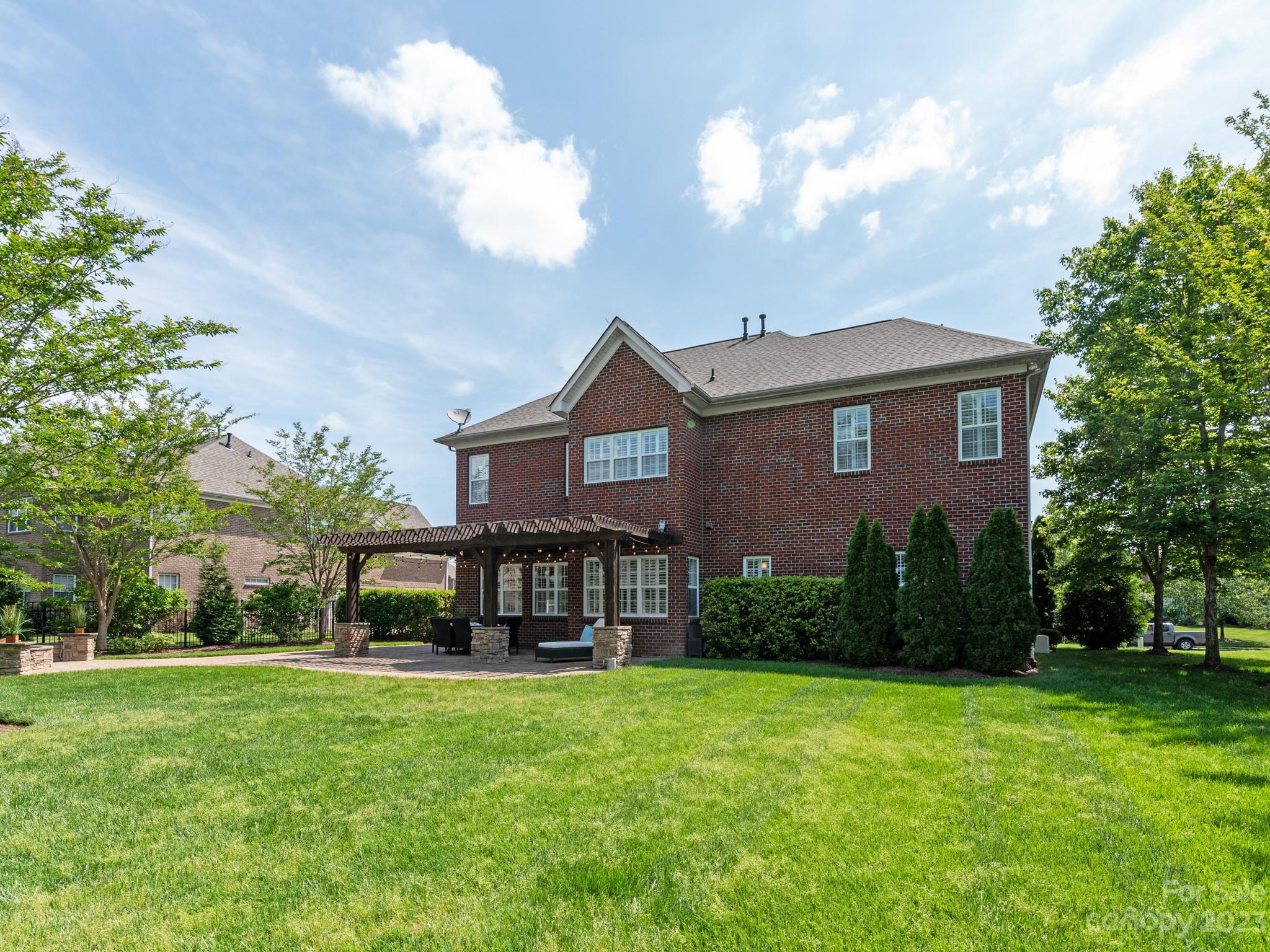 11510 Wheat Ridge Road Charlotte, NC 28277 - Photo 41 of 48 a front view of a house with garden