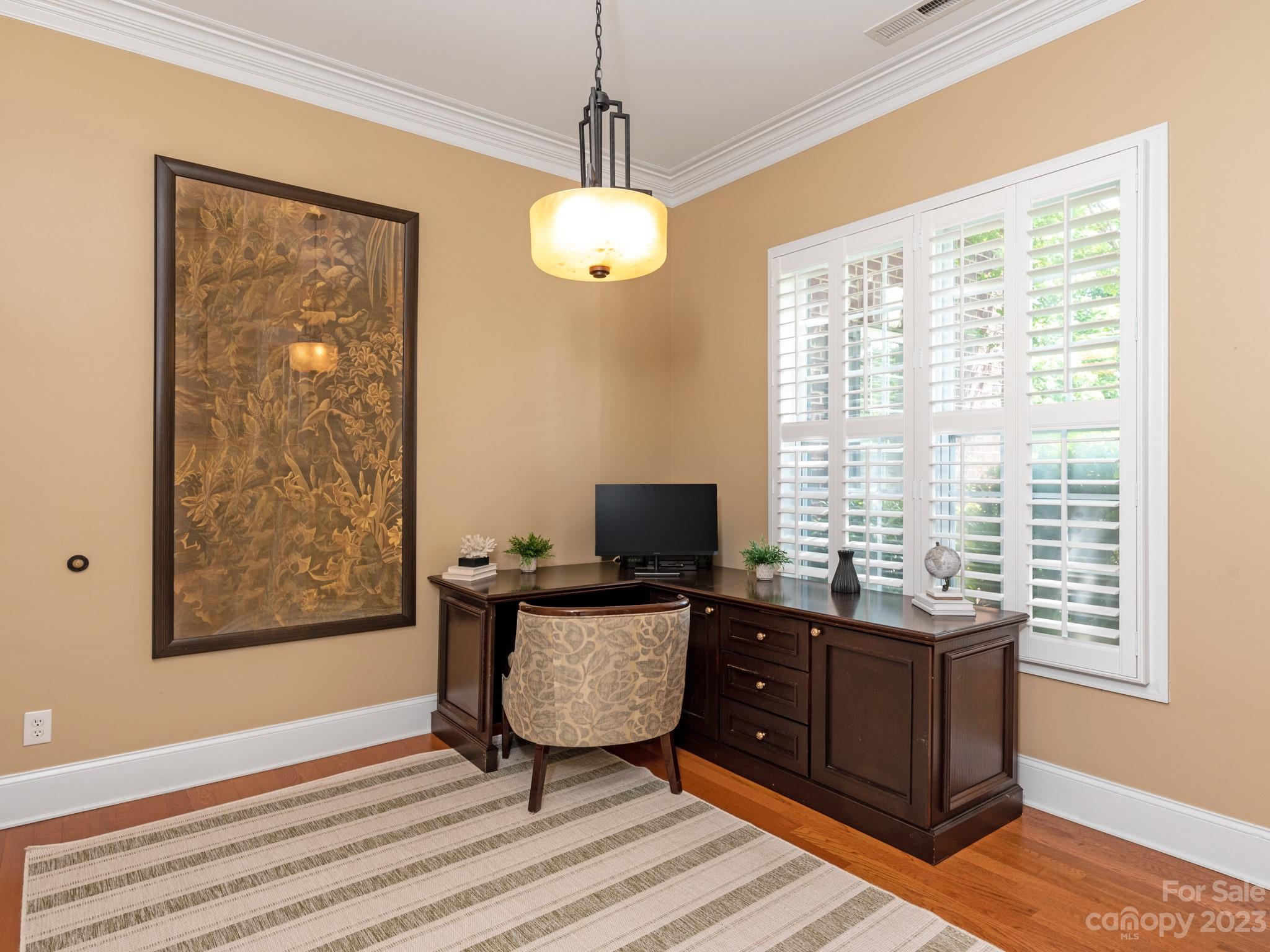 11510 Wheat Ridge Road Charlotte, NC 28277 - Photo 6 of 48 a view of a workspace with furniture and a window