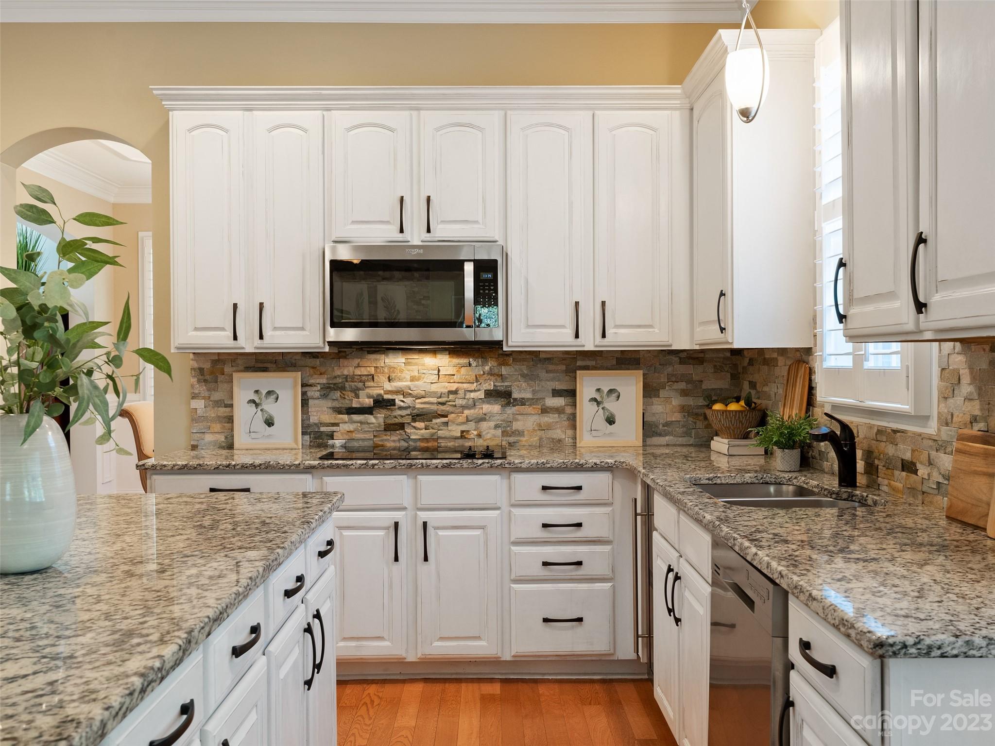 11510 Wheat Ridge Road Charlotte, NC 28277 - Photo 8 of 48 a kitchen with granite countertop a sink a stove and cabinets
