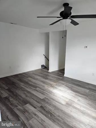 a view of a big room with wooden floor