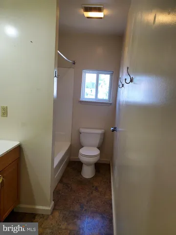 a bathroom with a toilet