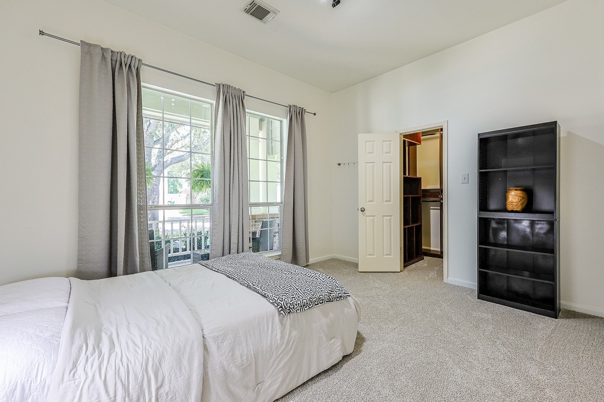 10306 Rudolph Court Missouri City, TX 77459 - Photo 20 of 34 This generous secondary bedroom offers plenty of square footage, large windows that flood the room with natural light and new plush carpet.