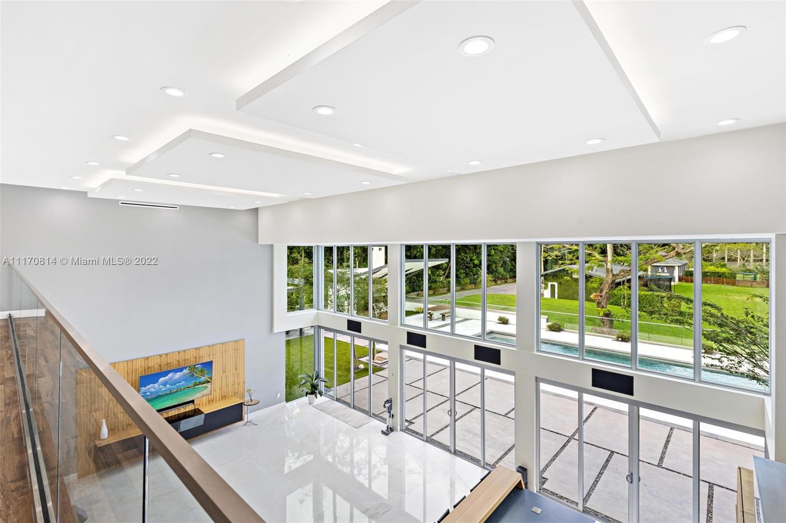 143-xx Stirling Road Southwest Ranches, FL 33330 - Photo 14 of 76 a living room with furniture and a large window