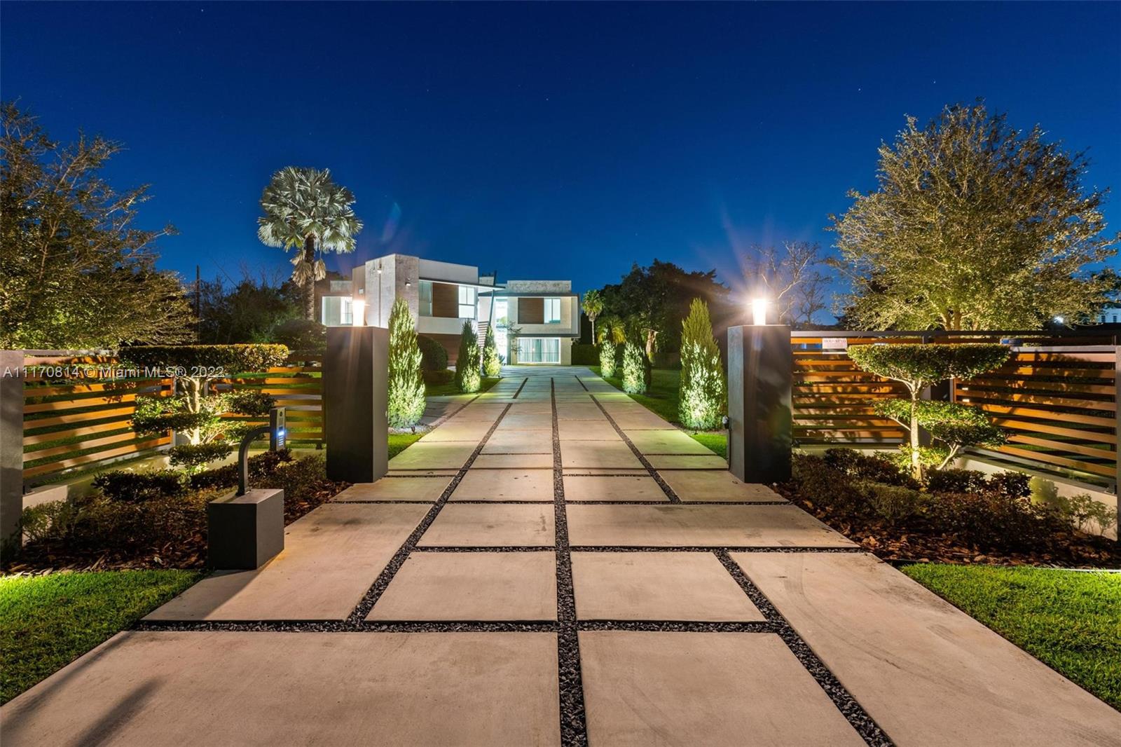 143-xx Stirling Road Southwest Ranches, FL 33330 - Photo 2 of 76 a view of a pathway with a building in the background