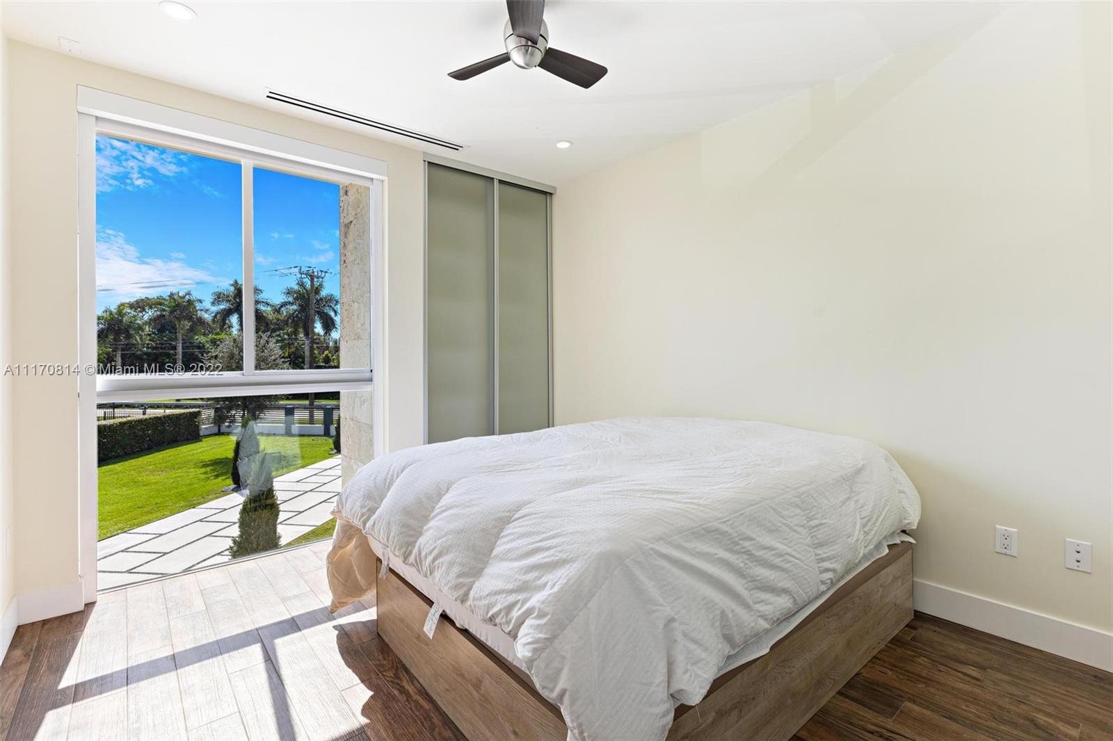 143-xx Stirling Road Southwest Ranches, FL 33330 - Photo 29 of 76 a bedroom with a bed and a view of balcony