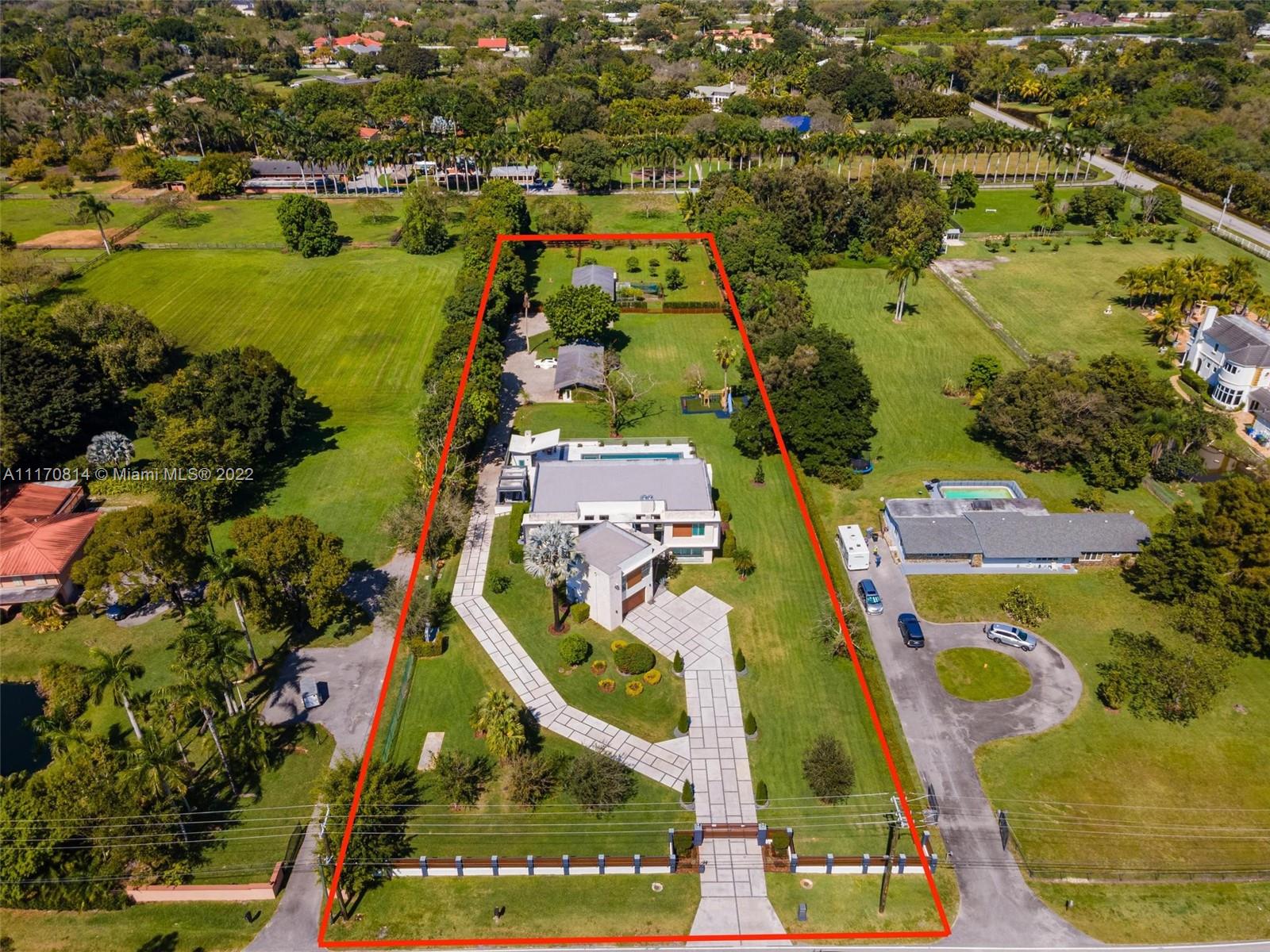 143-xx Stirling Road Southwest Ranches, FL 33330 - Photo 3 of 76 an aerial view of residential houses with outdoor space