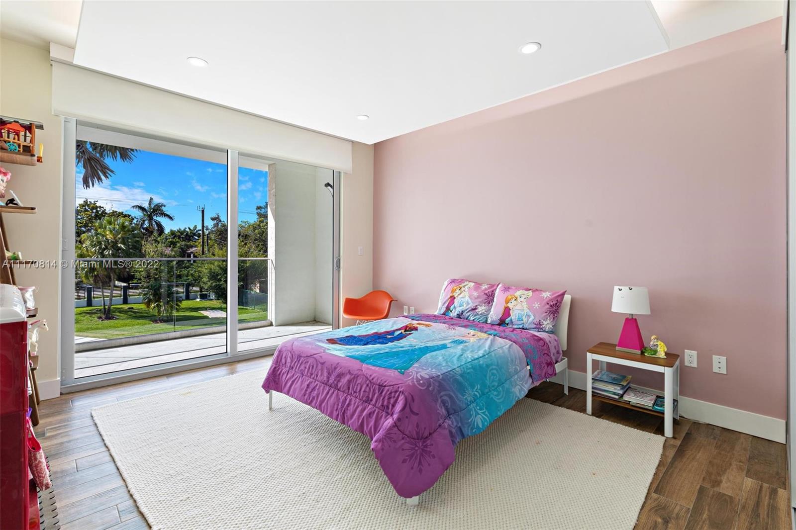 143-xx Stirling Road Southwest Ranches, FL 33330 - Photo 35 of 76 a bedroom with a bed and a window