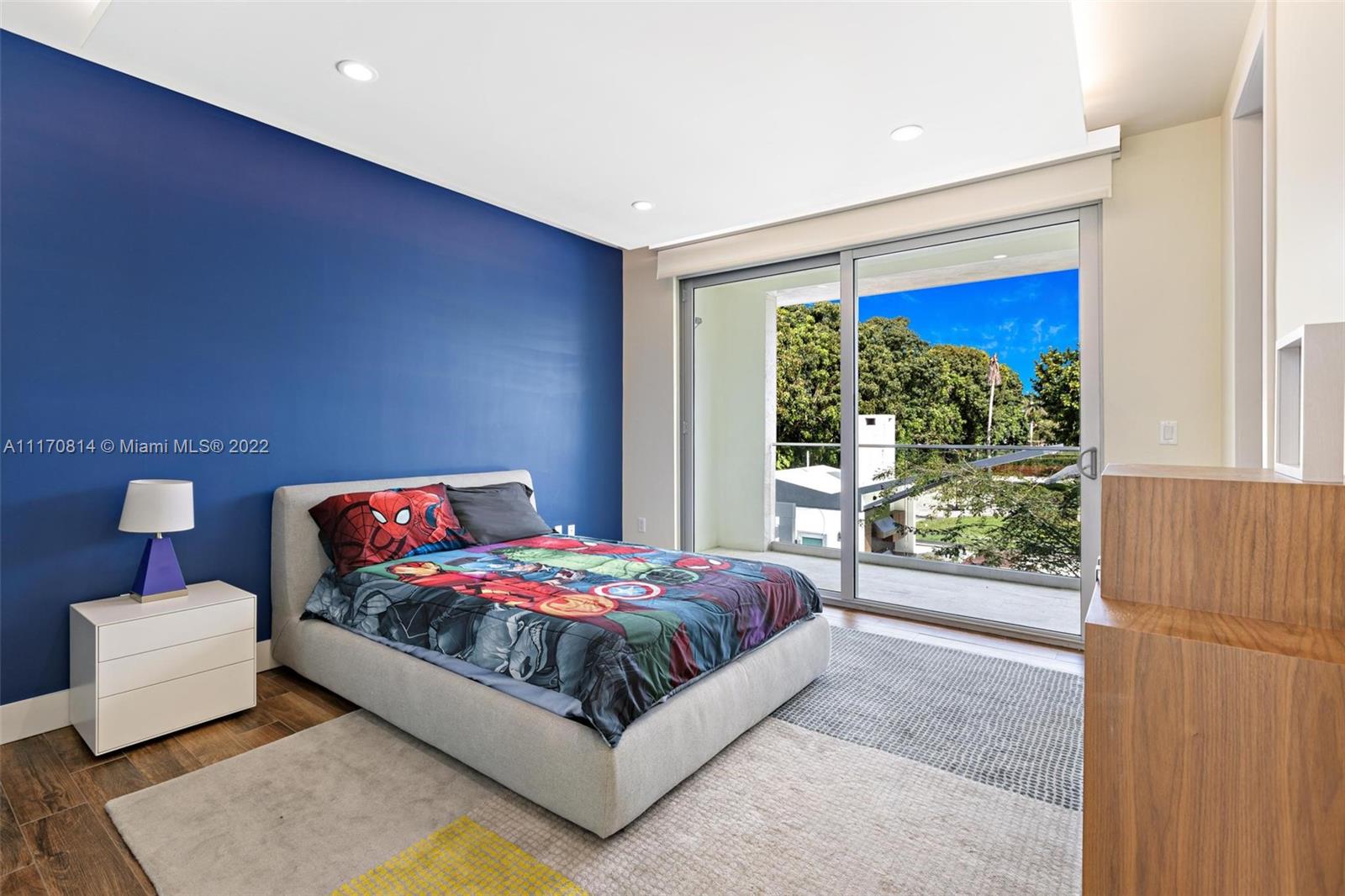 143-xx Stirling Road Southwest Ranches, FL 33330 - Photo 38 of 76 a bedroom with a bed and a window