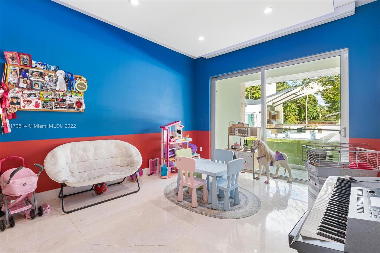 143-xx Stirling Road Southwest Ranches, FL 33330 - Photo 41 of 76 a living room with furniture and a large window