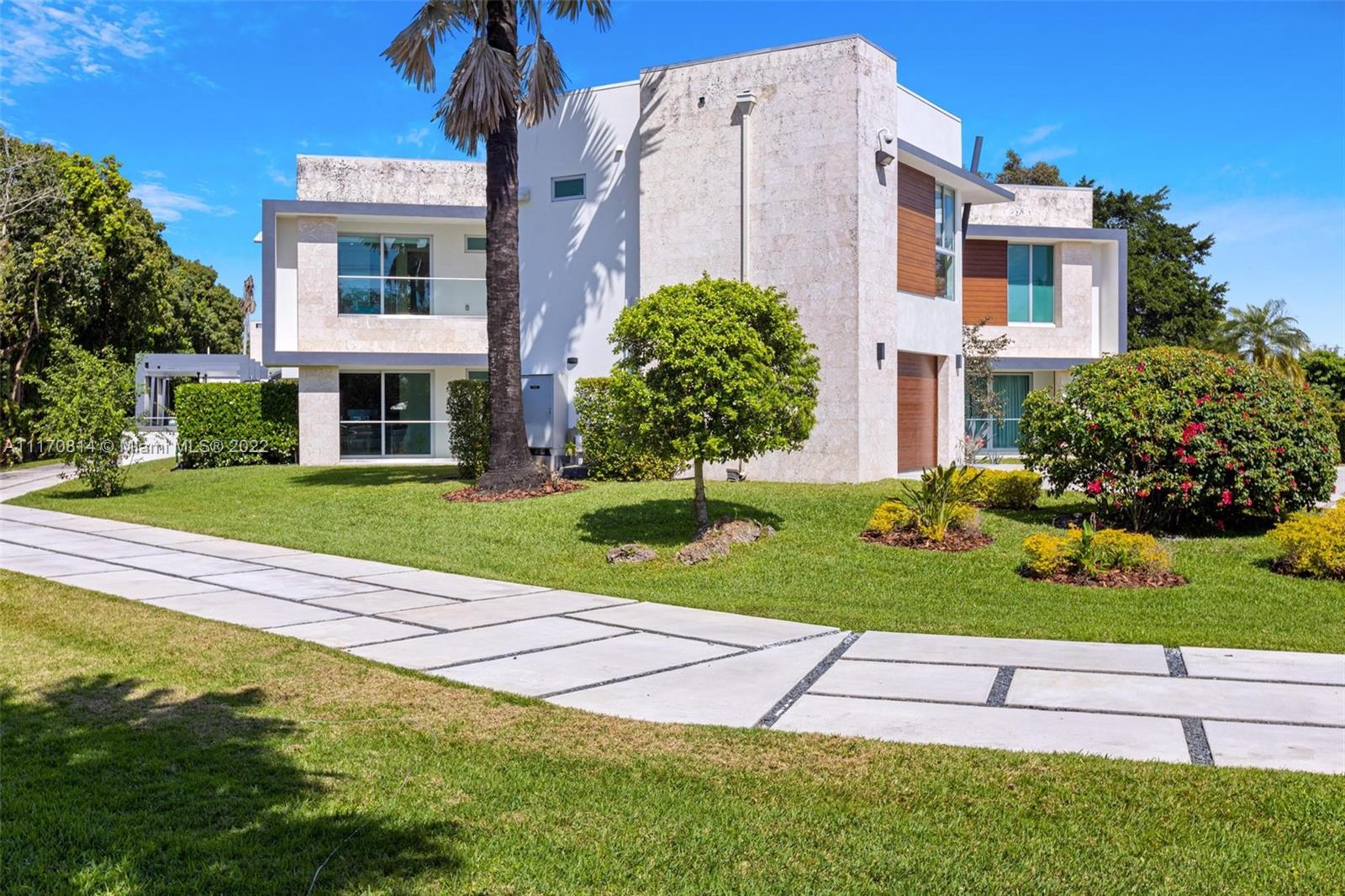 143-xx Stirling Road Southwest Ranches, FL 33330 - Photo 63 of 76 a front view of a house with a yard