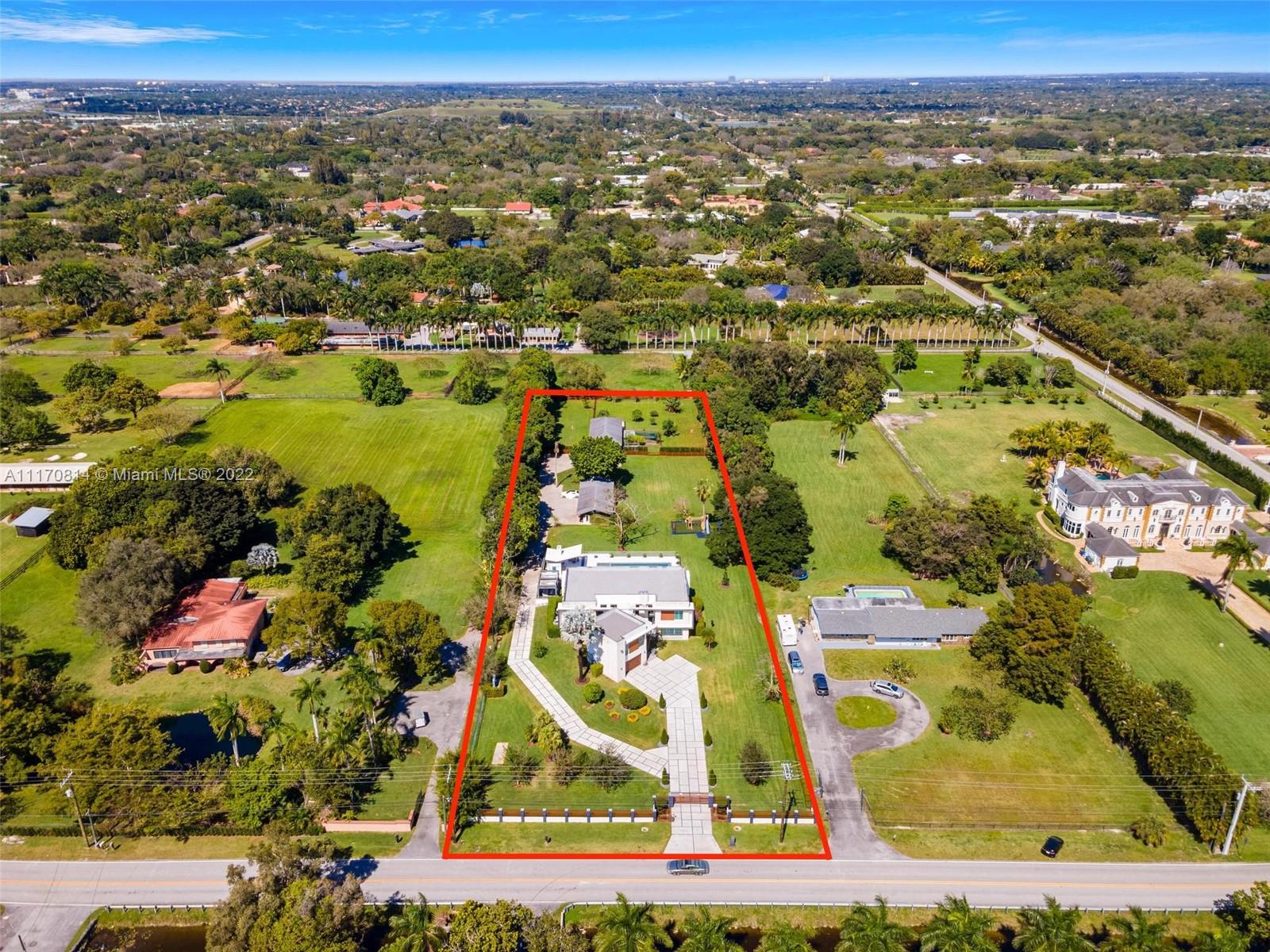 143-xx Stirling Road Southwest Ranches, FL 33330 - Photo 71 of 76 an aerial view of residential houses with outdoor space