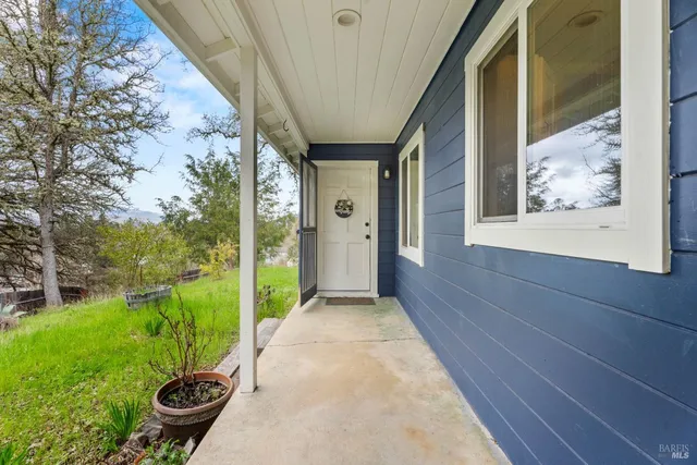 a view of a porch with garden