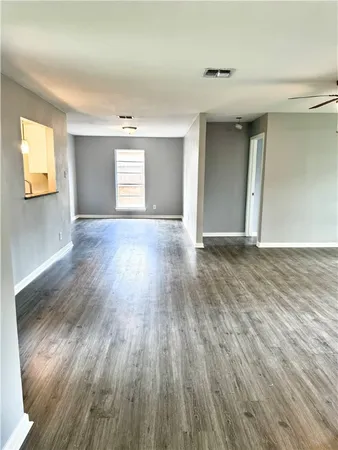 a view of an empty room and window
