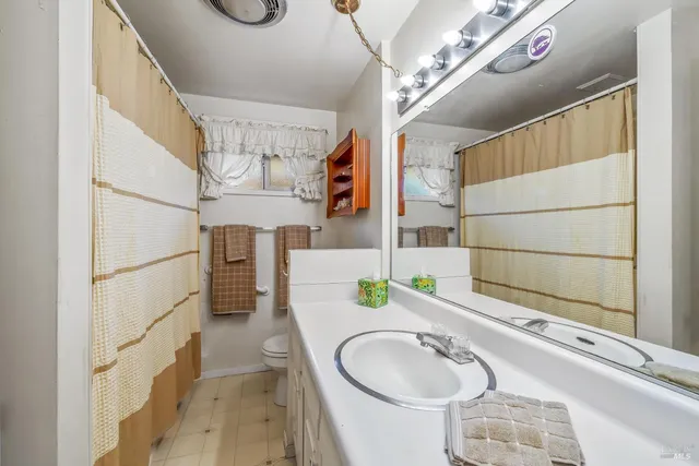 a bedroom with a bed and a closet