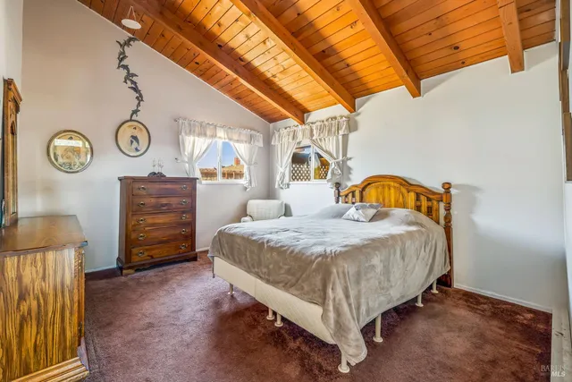 a view of a bathroom with a sink and shower