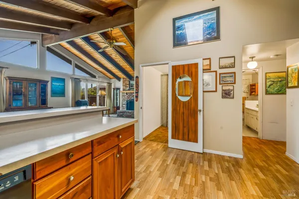 a bathroom with a toilet a sink and a mirror