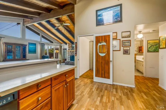 a bathroom with a toilet a sink and a mirror