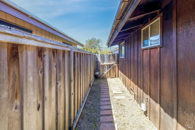 a view of backyard with cabin