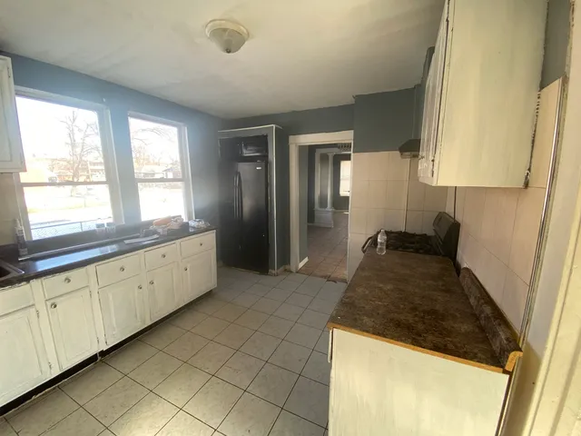 $180,000 | 15736 Lathrop Avenue, Harvey, IL 60426