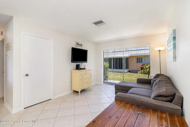 a bathroom with a bathtub and shower curtain