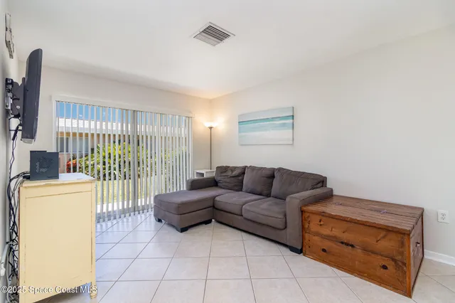 a kitchen with stainless steel appliances granite countertop a sink a refrigerator and a stove