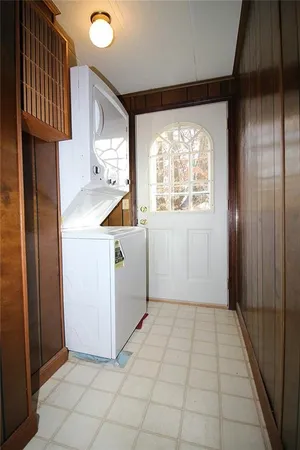 a view of a kitchen with a sink and a window