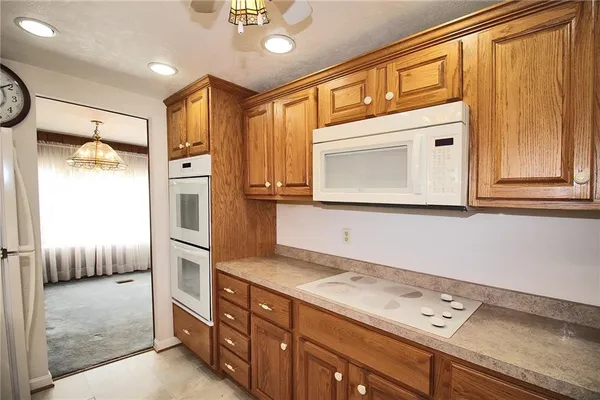 a bathroom with a sink a mirror and a shower
