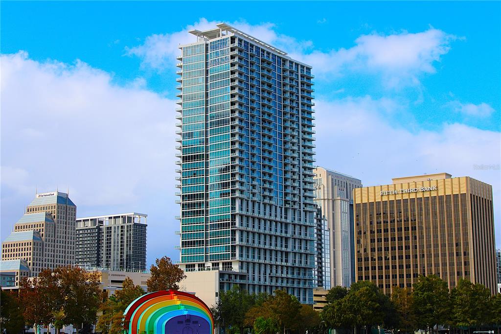 a view of a city with tall buildings