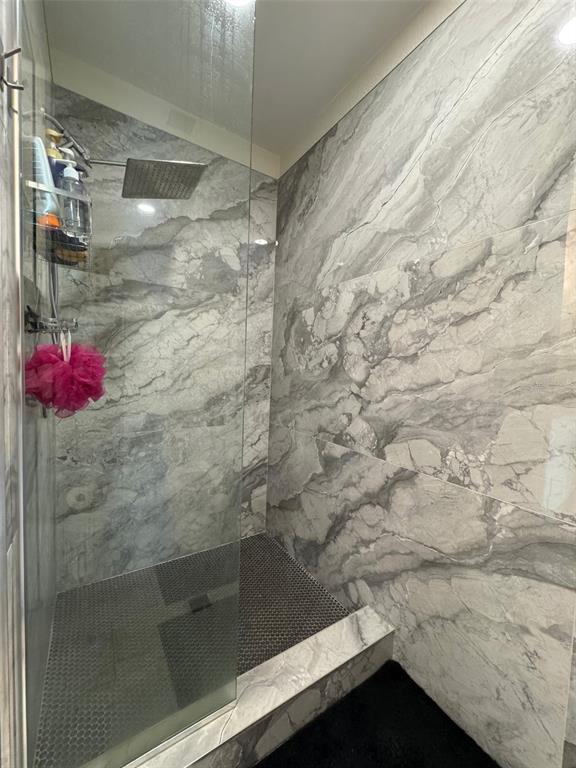 150 East Robinson Street, Unit 2409 Orlando, FL 32801 - Photo 11 of 26 a bathroom with a shower