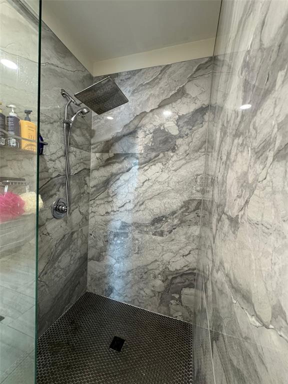 150 East Robinson Street, Unit 2409 Orlando, FL 32801 - Photo 12 of 26 a bathroom with a shower