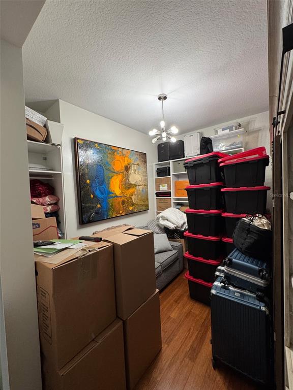 150 East Robinson Street, Unit 2409 Orlando, FL 32801 - Photo 21 of 26 a living room with furniture and a flat screen tv