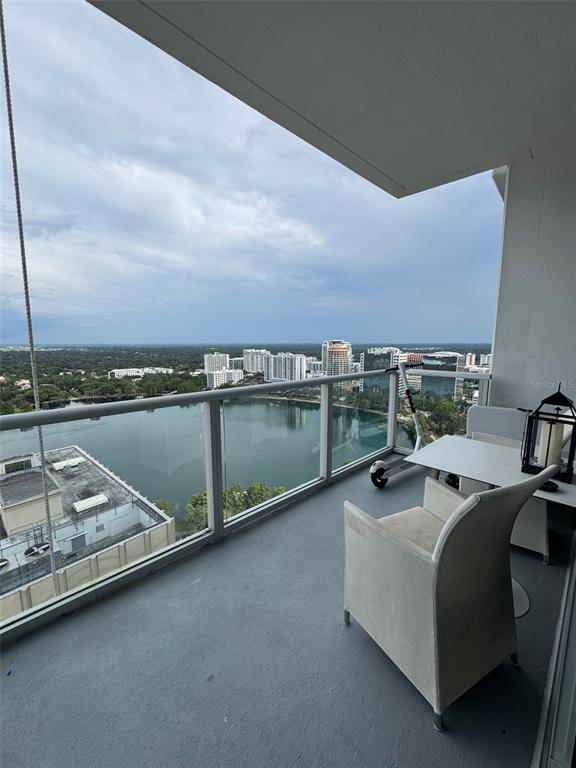 150 East Robinson Street, Unit 2409 Orlando, FL 32801 - Photo 25 of 26 a view of a terrace with couches and sky view