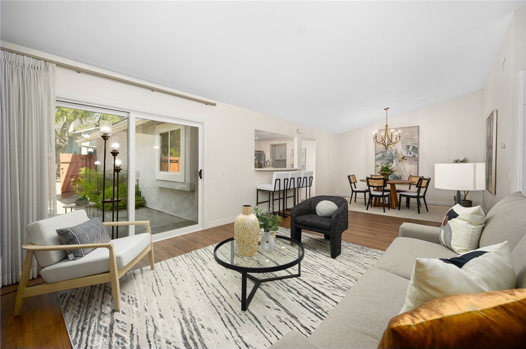 751 Ocean View Avenue, Unit A Monrovia, CA 91016 - Photo 11 of 29 a living room with furniture and a large window