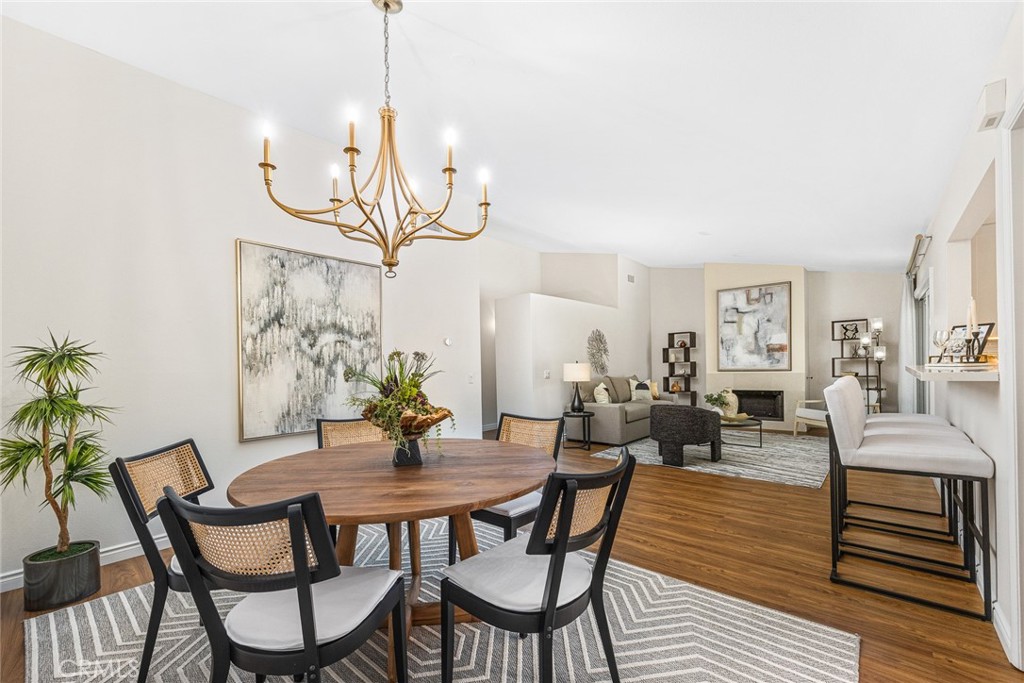 751 Ocean View Avenue, Unit A Monrovia, CA 91016 - Photo 14 of 29 a view of a dining room with furniture and wooden floor