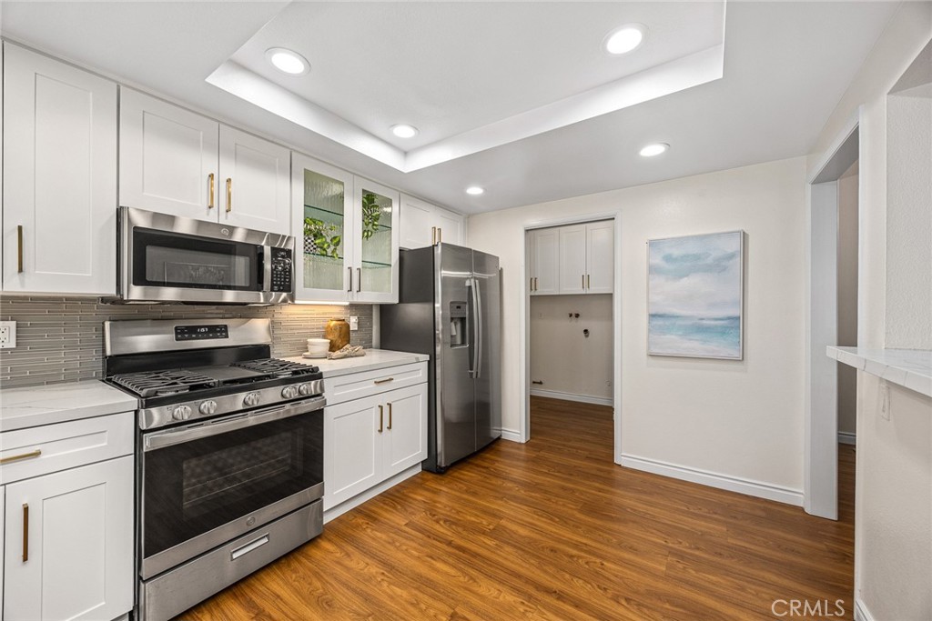 751 Ocean View Avenue, Unit A Monrovia, CA 91016 - Photo 15 of 29 a kitchen with stainless steel appliances a stove microwave and a refrigerator