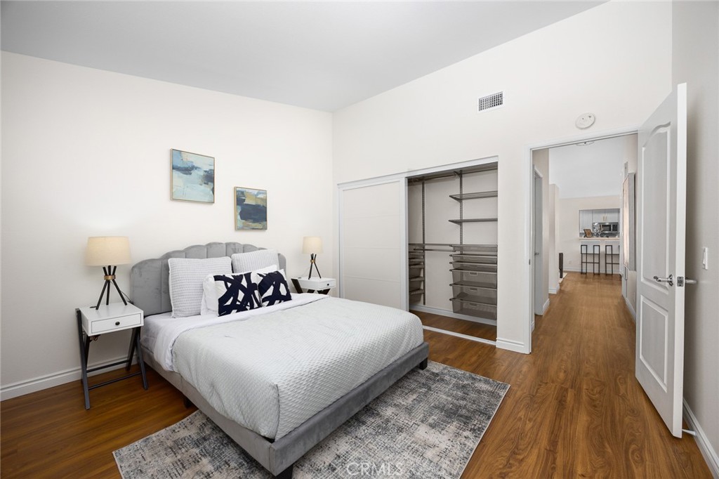 751 Ocean View Avenue, Unit A Monrovia, CA 91016 - Photo 18 of 29 a bed room with a bed and a walk in closet