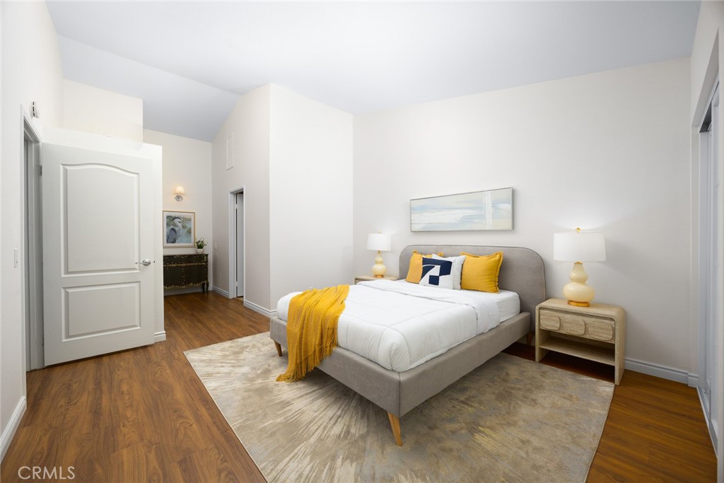 751 Ocean View Avenue, Unit A Monrovia, CA 91016 - Photo 21 of 29 a bedroom with a bed and a table