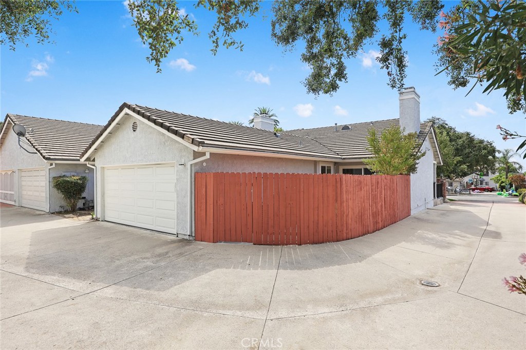 751 Ocean View Avenue, Unit A Monrovia, CA 91016 - Photo 28 of 29 a view of a house with a backyard and a garage