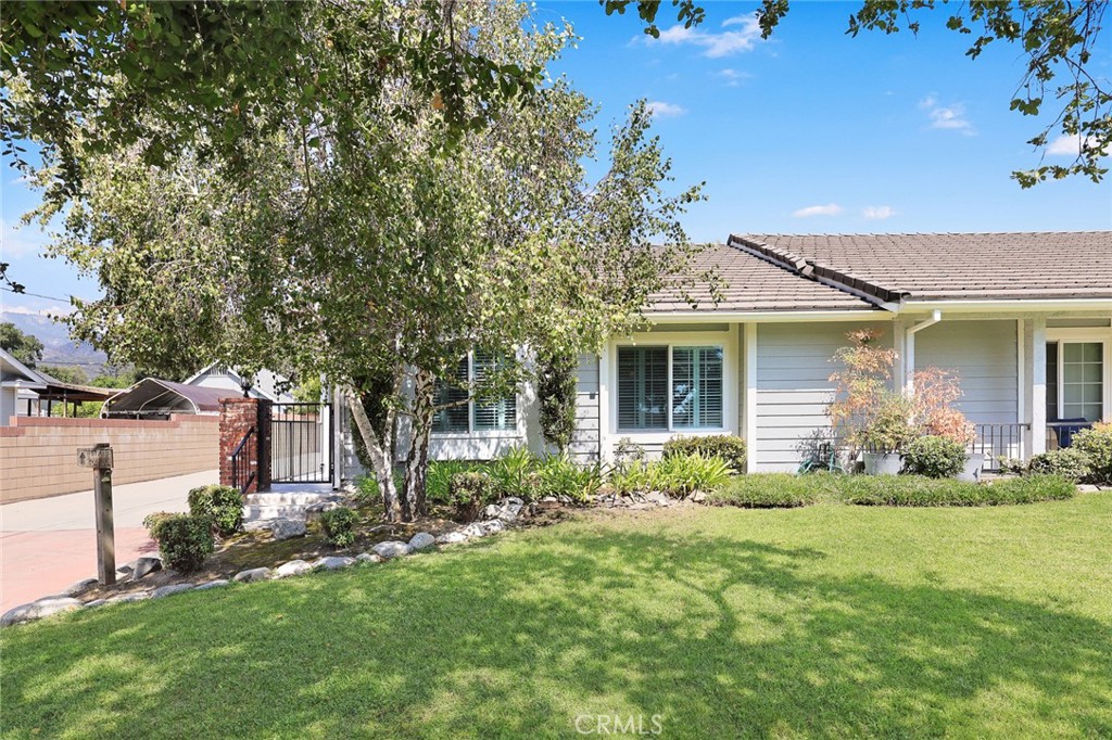 751 Ocean View Avenue, Unit A Monrovia, CA 91016 - Photo 4 of 29 front view of a house with a yard
