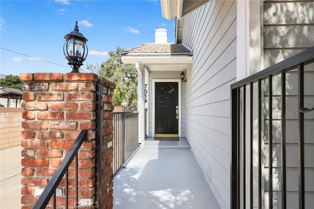 751 Ocean View Avenue, Unit A Monrovia, CA 91016 - Photo 5 of 29 a view of front door with stairs