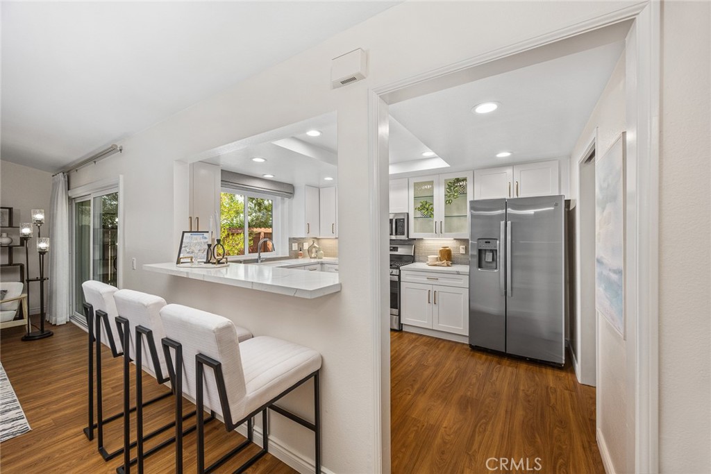 751 Ocean View Avenue, Unit A Monrovia, CA 91016 - Photo 10 of 29 a kitchen with refrigerator and microwave